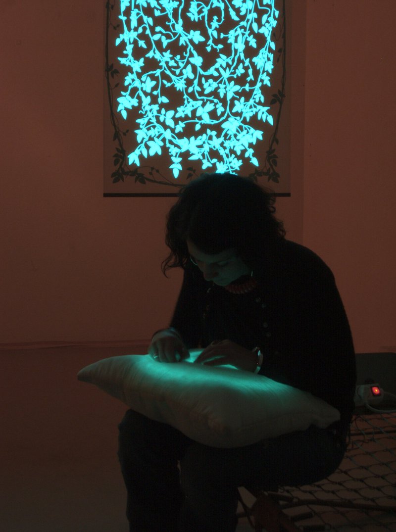 Rachel Wingfield preparing the Illumine exhibition